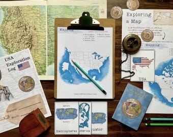 May include: A collection of travel-themed items, including a USA Exploration Log, a map of the United States, a compass, and a passport. The items are arranged on a wooden surface, suggesting a theme of exploration and travel.