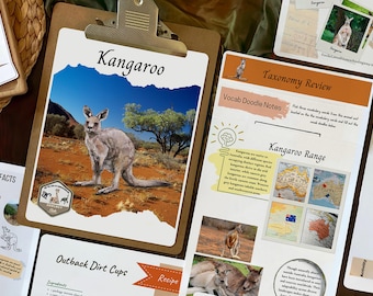 May include: A clipboard with a "Kangaroo" card featuring a kangaroo illustration in a desert landscape. Additional cards include "Taxonomy Review," "Outback Dirt Cups," and "300 FACTS."