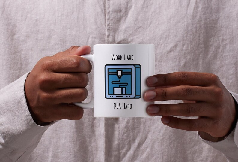 May include: White ceramic mug with a blue and black 3D printer graphic and the text "Work Hard PLA Hard".