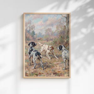 Pode incluir: Uma impressão emoldurada com uma cena pastoral com quatro cães. Os cães são brancos e pretos, e brancos e castanhos. O fundo mostra árvores e um céu nublado, com uma paleta de cores suaves.