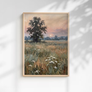 Pode incluir: Pintura de paisagem emoldurada que retrata uma cena de campo serena. Uma grande árvore se destaca, com um pôr do sol ao fundo. A obra de arte apresenta uma paleta de verdes, marrons e rosas suaves, criando uma atmosfera tranquila.
