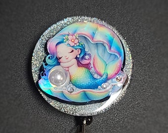 Glitter mermaid retractable badge reel. Holographic design, badge clip, sleeping mermaid