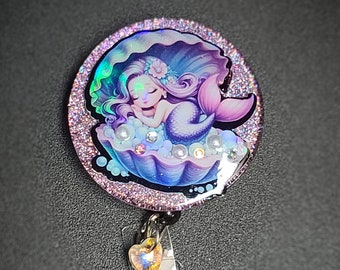 Glitter mermaid retractable badge reel. Holographic design, badge clip, sleeping mermaid
