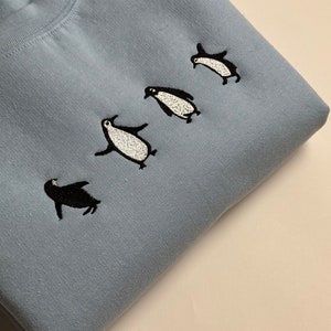 Adorable Penguins Embroidered Sweatshirt | Cozy Winter Fashion Cute Penguin Design | Soft & Warm Penguin Lovers Gift