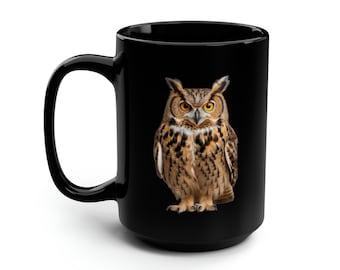 May include: Black ceramic coffee mug with a brown and white owl image printed on the front.