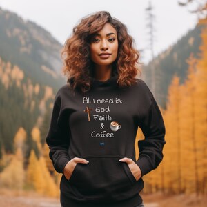 May include: Black hoodie with a white graphic that says "All I need is: God Faith & Coffee" with a cross and a cup of coffee.