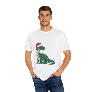 Dinosaur Santa Hat T-shirt, Christmas Lights Tee, Holiday Graphic Shirt, Festive Winter Top, Unisex Clothing