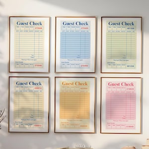 May include: Six framed prints of vintage-style guest checks in various pastel colors, including blue, yellow, and pink. Each print features the words "Guest Check" at the top and a series of lines for itemization.