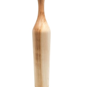 May include: A wooden vase with a light brown colour and a natural wood grain pattern. The vase has a narrow neck and a wide base.