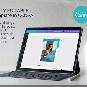 May include: A laptop screen displaying a Canva design template for a business proposal. The template features a woman in a blue shirt and a blue and white background. The text on the screen reads "Business Proposal 2". The laptop is on a white table with a white mug and a white vase.