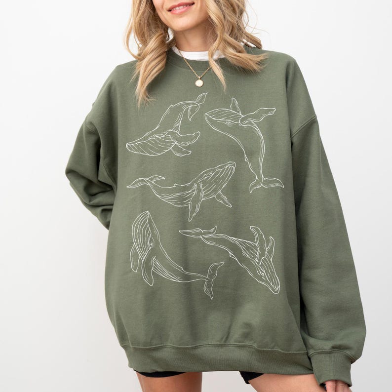 fine line art humpback whale sweater light green