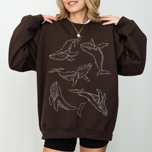 fine line art humpback whale sweater brown