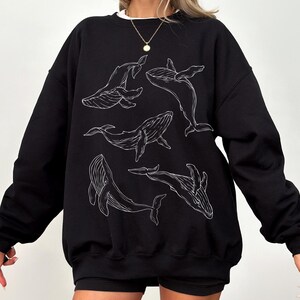 fine line art humpback whale sweater black