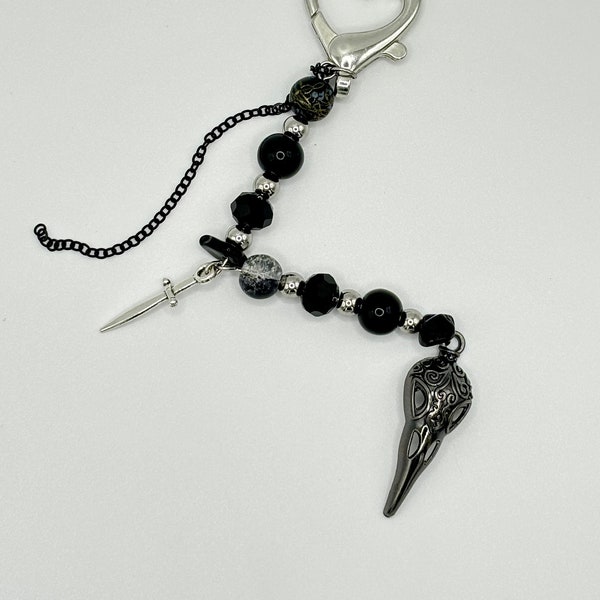 Dark Elegance Keychain Handmade with Black Beads, Dagger Charm, Bird Skull Charm, and Heart Clasp Unique Gothic Accessory Black Keychain