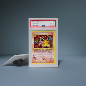 Pin: Charizard-pinbasisset uit 1999, eerste editie Shadowless Graded 10 emaille pins
