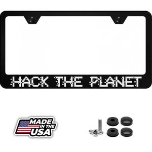 May include: Black license plate frame with the text "HACK THE PLANET" in pixelated white letters. Includes mounting hardware and a "Made in the USA" sticker.