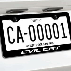 May include: A black rectangular license plate frame featuring the white text EVIL CAT centered on the bottom edge. The frame is mounted around a white license plate with the black text CA-00001, YOUR STATE, and PREMIUM LICENSE PLATE FRAME.