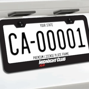 May include: A black license plate frame featuring the white text "PREMIUM LICENSE PLATE FRAME" and "MIDNIGHT CLUB" with red Japanese characters underneath. The frame surrounds a white license plate with the text "YOUR STATE" and "CA-00001".