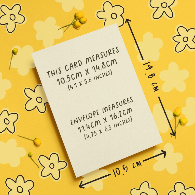 May include: A cream-colored card with text indicating dimensions: 4.1 x 5.8 inches. The envelope measures 4.75 x 6.5 inches. The card and envelope are on a yellow background with flower and bud illustrations.