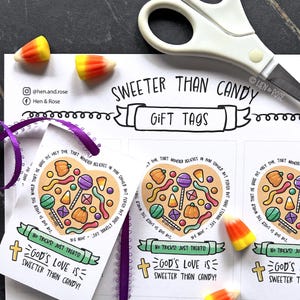 May include: Gift tags with a heart-shaped candy design, featuring pumpkins, lollipops, and candy corn. The tags have a purple ribbon and the text "Sweeter Than Candy" and "God's Love is Sweeter Than Candy!"