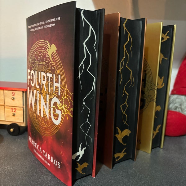 Fourth Wing and Iron Flame with sprayed edges - English edition