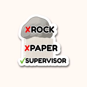May include: A die-cut sticker featuring a gray rock illustration next to a red X, a piece of grid paper next to a red X, and the text SUPERVISOR next to a green checkmark. The design is arranged vertically with the rock on top and text below.