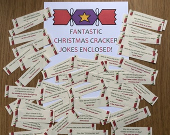 May include: A collection of colorful Christmas cracker jokes printed on paper strips. The jokes are written in a fun and festive font. The crackers are decorated with red and white stripes and a star.