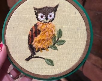 Embroidered owl on tree branch wall hanging