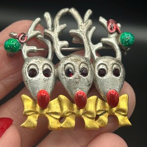 Vintage pewter reindeer brooch