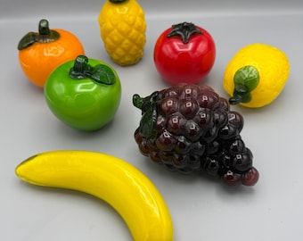 Seven piece glass fruit set (banana, lemon, orange, green apple, purple grapes, pineapple, tomato)