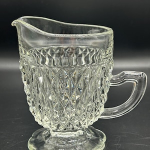 MCM Indiana Glass diamond point creamer with flower shape base