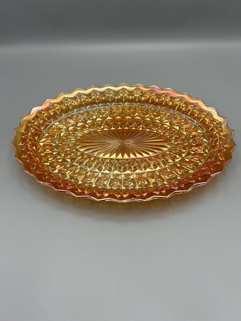 Marigold peach carnival glass Jeanette holiday buttons and bows platter