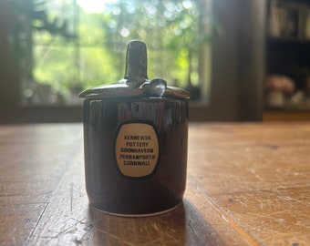 Brown pottery lidded sugar dish with tiny serving spoon