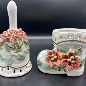 Two piece porcelain seasonal decor, poinsettia Christmas boot and bell
