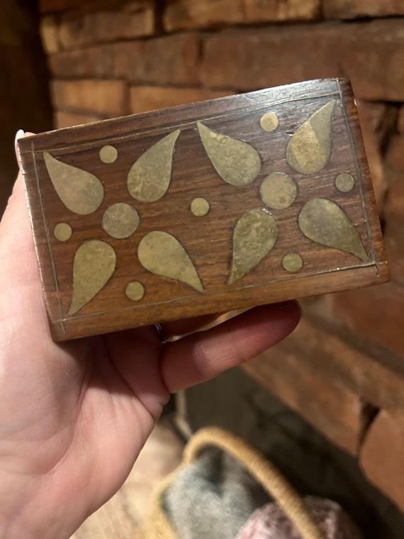 Wooden box with brass detailing