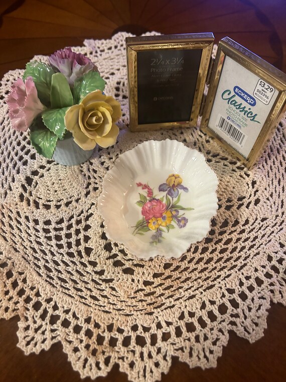 Sweet 3 piece lot includes vintage gold tone bifold frame, oval floral dish, with bone china vase with porcelain flowers