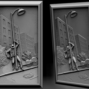 May include: A black and white 3D relief sculpture of a man playing a cello on a city street. The man is leaning against a street lamp and the cello is on the ground. The sculpture is framed in a black frame.