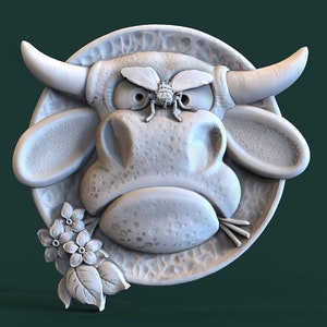 May include: A white ceramic relief sculpture of a cow's face with a fly on its nose. The cow has a grumpy expression and is surrounded by flowers.