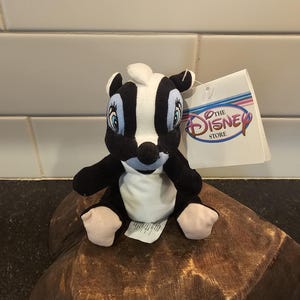 Vintage Disney Store flower the skunk beanie plush toy with tag from bambi