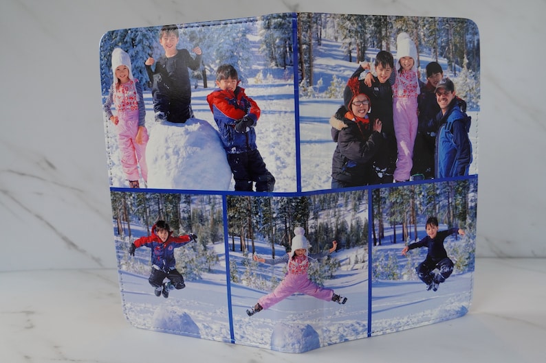 May include: A collage of six photographs featuring a family of five enjoying a snowy day. The photographs show the family playing in the snow, building a snowman, and jumping in the air. The photographs are printed on a white background with blue borders.