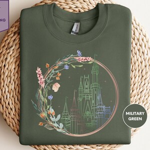 a t - shirt with a picture of a castle on it