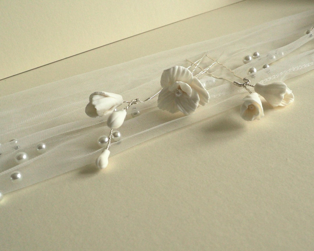 emma accessory ホワイトフラワー　ピアス EMMA.ACCESSORY.K ホワイトフラワーピアス