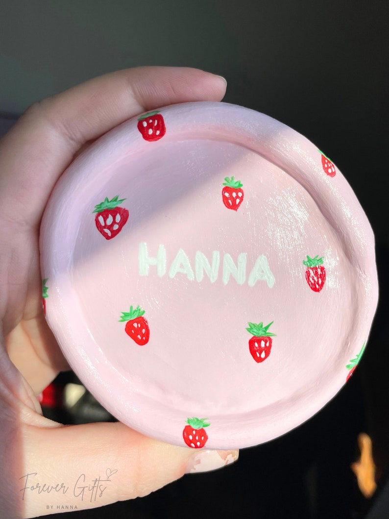 Give the gift of love with our light pink hand-painted air-dry clay ring trinket dish. Perfect for bridesmaids, Valentine's, or weddings. Each piece is a unique expression of handmade beauty.