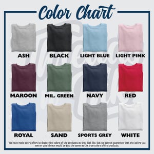 May include: Color chart showing 12 different sweatshirt colors: ash, black, light blue, light pink, maroon, military green, navy, red, royal blue, sand, sports grey, and white.