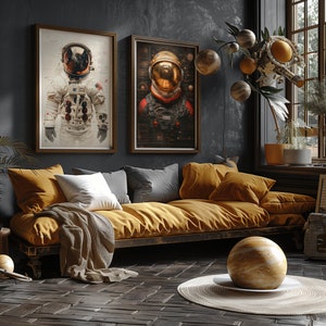 May include: A mustard yellow couch with dark gray throw pillows and a white throw blanket. Two framed illustrations of astronauts in space suits are hanging on the wall behind the couch. A large, round, gold-colored orb sits on a woven rug in front of the couch.
