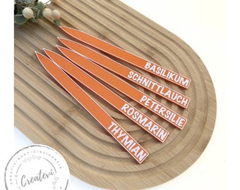 Orange PETG plant marker set, weatherproof, for herb gardens, raised beds, and vegetables, with white lettering, 3D printed