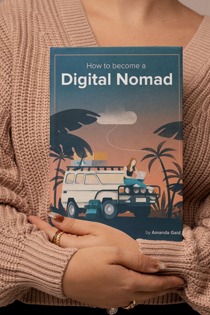 May include: A book cover with a blue background and the title "How to become a Digital Nomad" in white text. The cover features an illustration of a person working on a laptop in a car with palm trees in the background.
