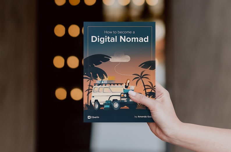 May include: A book cover with a blue background and the title "How to become a Digital Nomad" in white text. The cover features an illustration of a person working on a laptop in a van with palm trees and a sunset in the background.