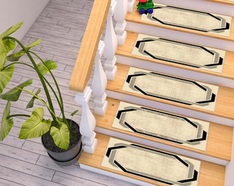 May include: Beige stair treads with a black and gray geometric pattern border. The treads are on a wooden staircase with a white railing.
