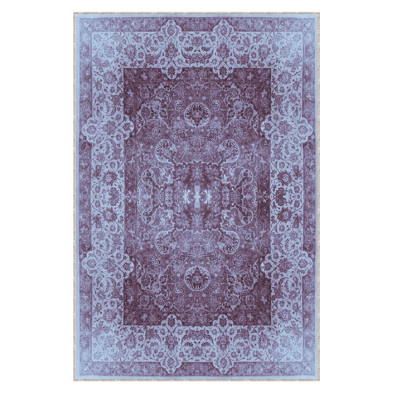 May include: A vintage-style rug with a blue and purple floral pattern. The rug has a detailed border with a repeating design.